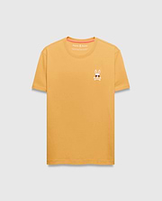 Mens Sunny Chest Graphic Tee. Golden yellow classic fit jersey t-shirt with a small embroidered Psycho Bunny skull logo wearing sunglasses on the left chest, featuring orange neck tape. (1)