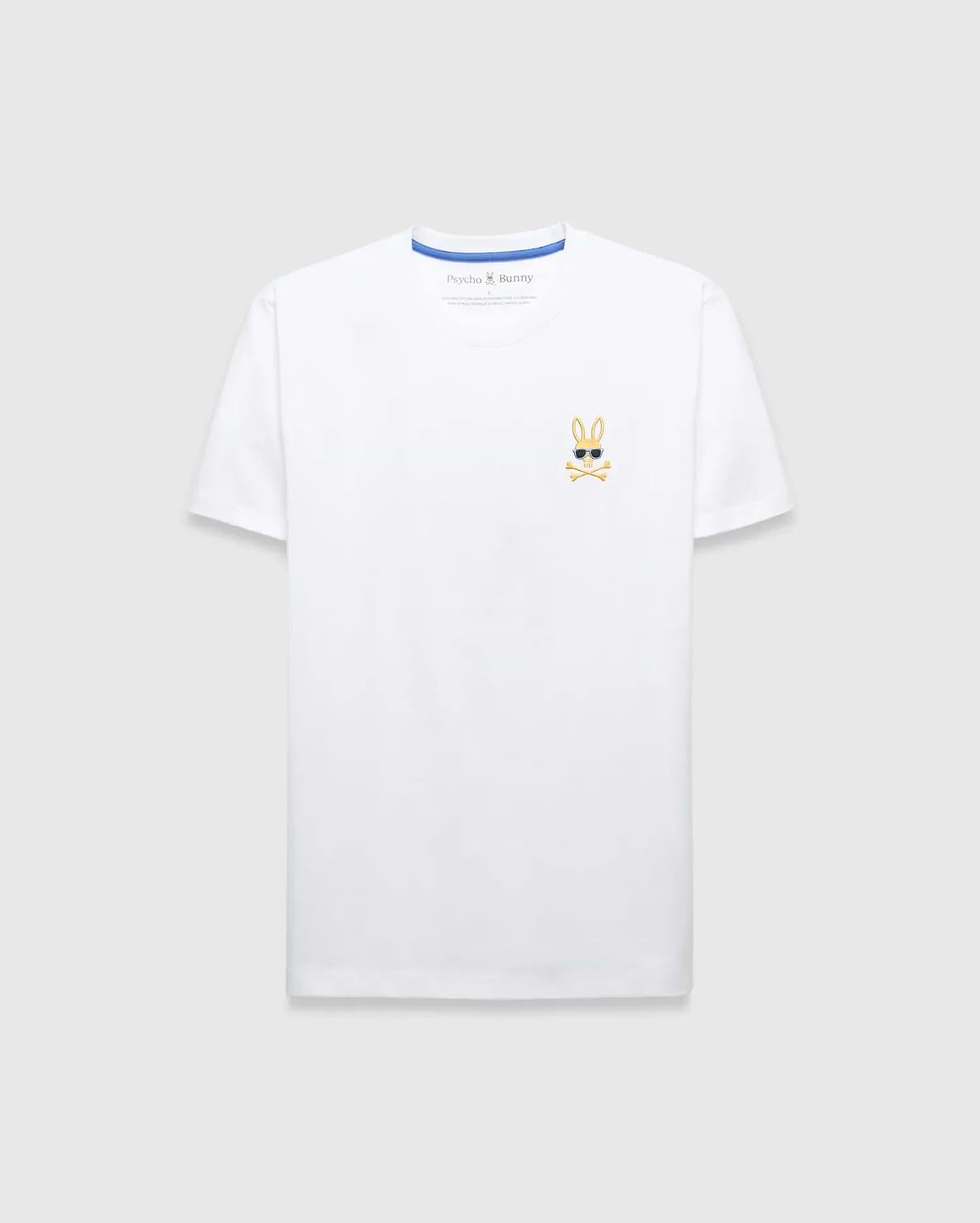 Mens Sunny Chest Graphic Tee, a classic fit white jersey t-shirt featuring a small embroidered gold Psycho Bunny skull logo with black sunglasses and white crossbones on the left chest, with blue inner collar trim.