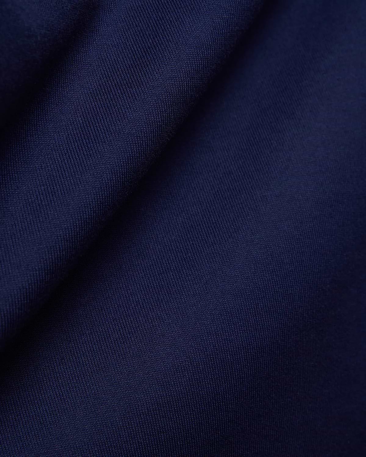 Psycho Bunny Mens Craig Wordmark Tee in rich, deep navy blue, crafted from a premium, soft, finely textured jersey knit fabric, embodying refined streetwear style. (6)