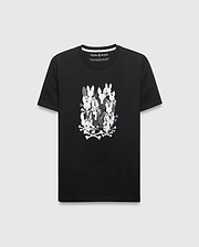 Mens Tanner Graphic Tee, a black classic fit jersey knit t-shirt featuring a large central graphic of stacked white and gray Psycho Bunny skull and crossbones.