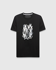 Mens Tanner Graphic Tee, a black classic fit jersey knit t-shirt featuring a large central graphic of stacked white and gray Psycho Bunny skull and crossbones.