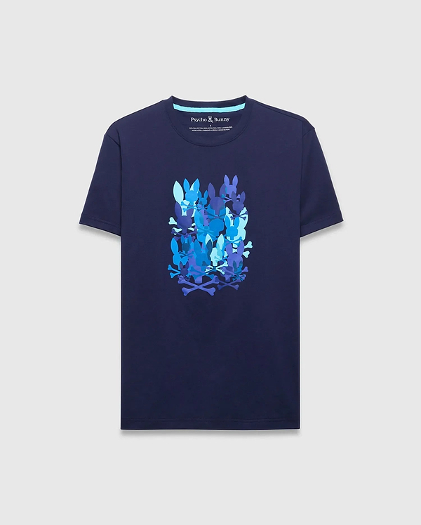Mens Tanner Graphic Tee, a classic fit navy jersey t-shirt featuring a large central graphic print of stacked Psycho Bunny skull and crossbones logos in various shades of blue.