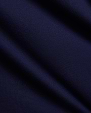 Mens Tanner Graphic Tee in rich navy blue, crafted from soft, finely textured premium jersey knit fabric with elegant folds, suggesting a comfortable, classic fit for refined streetwear.