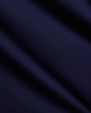 Mens Tanner Graphic Tee in rich navy blue, crafted from soft, finely textured premium jersey knit fabric with elegant folds, suggesting a comfortable, classic fit for refined streetwear.