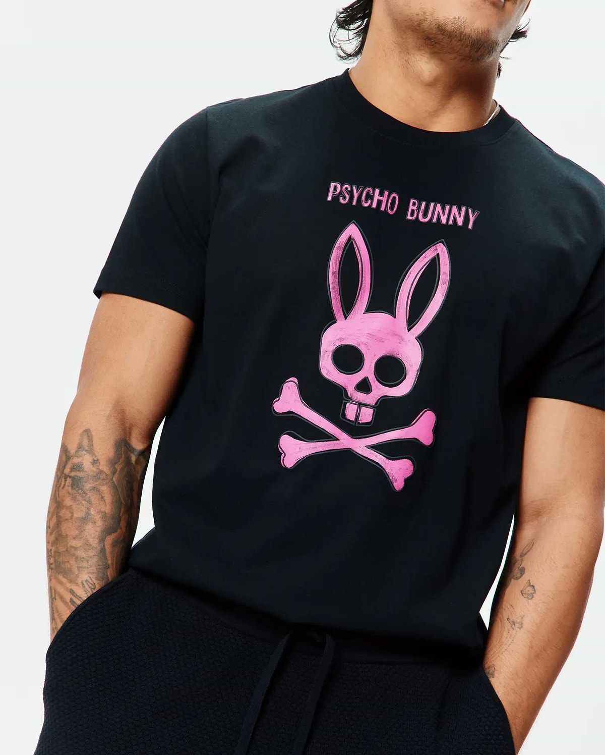 Mens Adler Graphic Tee, black classic fit jersey t-shirt with a large pink Psycho Bunny skull and crossbones graphic and PSYCHO BUNNY text on the chest. (3)