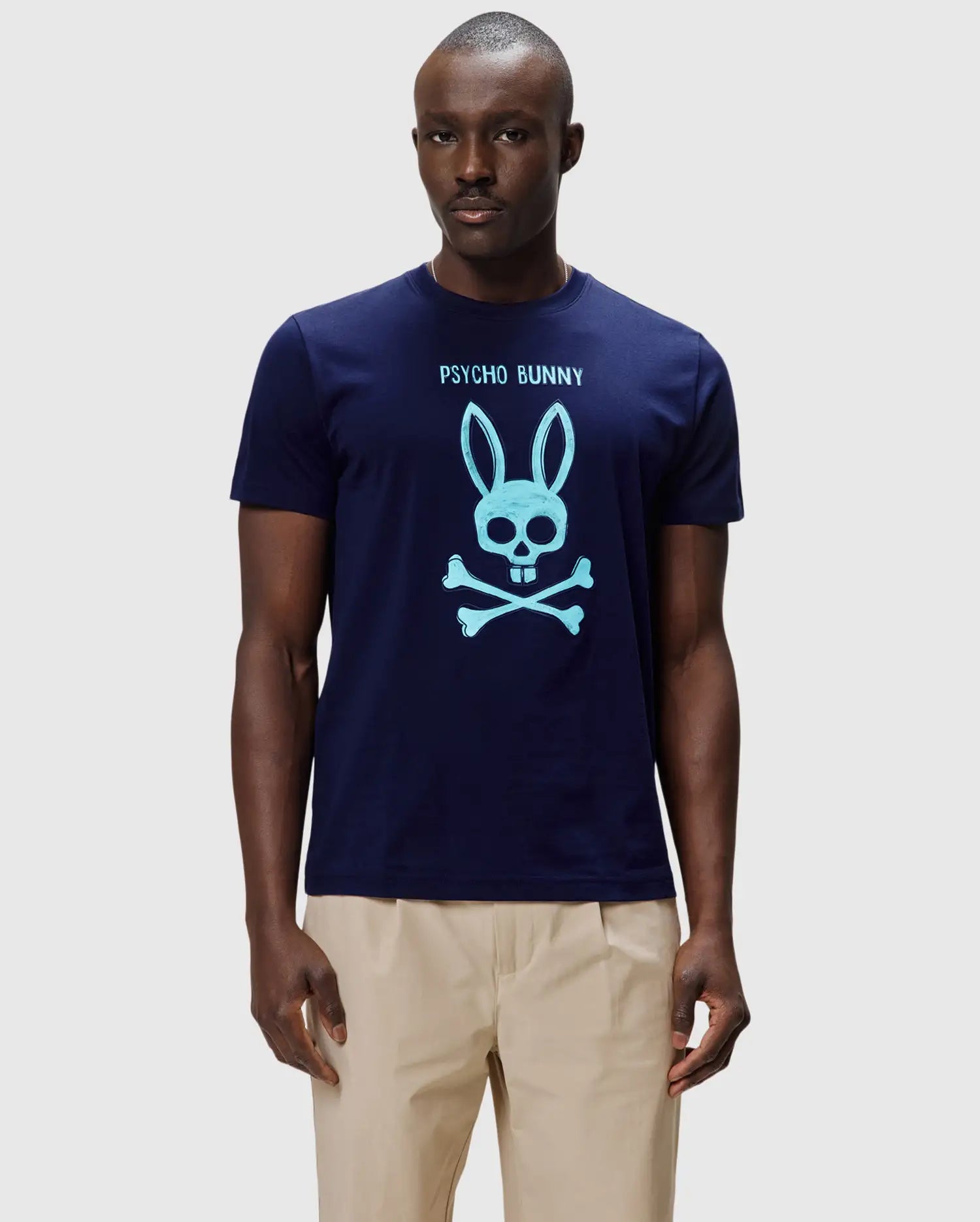 Mens Adler Graphic Tee, navy classic fit smooth jersey t-shirt with a large light blue Psycho Bunny skull and crossbones graphic and PSYCHO BUNNY text on the chest. (2)