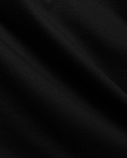 Close-up of the Mens Tobias Graphic Tee in deep black, highlighting its premium, soft cotton jersey knit fabric with subtle, flowing folds and a refined, smooth texture.