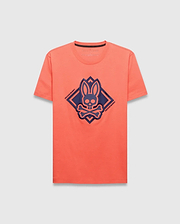Mens Tobias Graphic Tee, a classic fit coral jersey t-shirt with a large navy blue Psycho Bunny skull and crossbones logo within a diamond graphic on the chest.