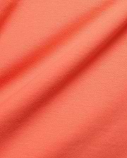 MENS TOBIAS GRAPHIC TEE in a rich, vibrant coral hue, crafted from premium, soft jersey knit fabric with subtle texture and elegant, flowing folds.