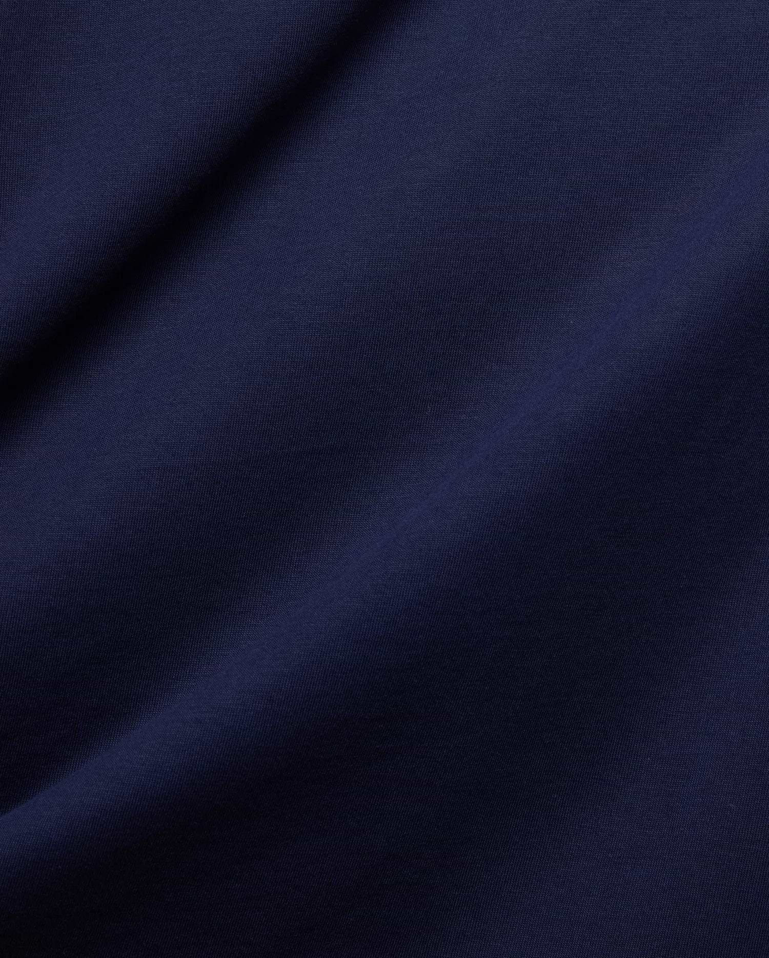 Rich, deep navy blue jersey knit fabric, showcasing a refined, smooth texture with subtle diagonal ribbing and soft, flowing folds, for the Mens Frank Back Graphic Tee.
