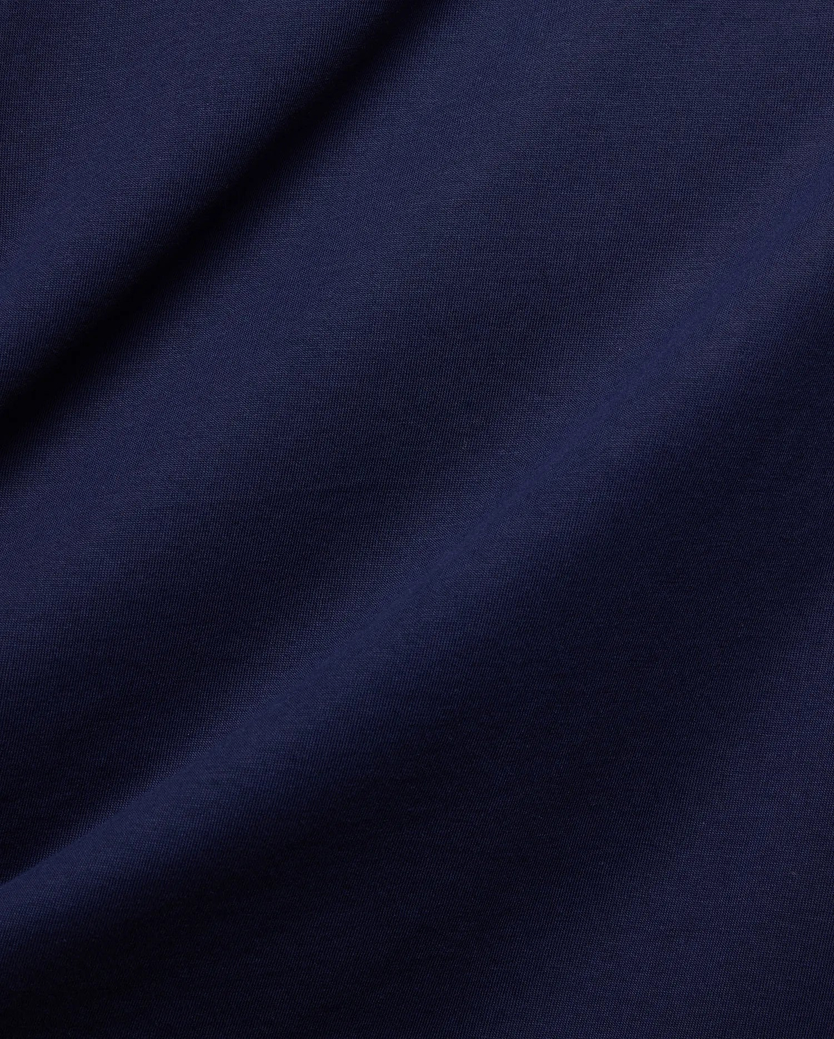Rich, deep navy blue jersey knit fabric, showcasing a refined, smooth texture with subtle diagonal ribbing and soft, flowing folds, for the Mens Frank Back Graphic Tee.