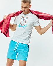 White Mens Dayton Graphic Tee, classic fit jersey, featuring a large orange and blue Psycho Bunny skull logo on the chest, paired with bright blue swim shorts with a small embroidered bunny logo. (4)