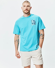 Mens Isaac Relaxed Fit Tee in vibrant aqua blue, a relaxed fit jersey t-shirt with a small, distressed blue and white Psycho Bunny skull graphic print on the left chest.
