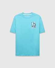 Mens Isaac Relaxed Fit Tee, an aqua jersey t-shirt with a relaxed fit, featuring a small embroidered Psycho Bunny logo and a larger multi-color graphic skull print on the left chest.