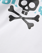 White jersey Mens Landon Wordmark Tee featuring a large black skull and crossbones graphic with a partial light blue Psycho Bunny wordmark print on the chest, embodying refined streetwear. (6)