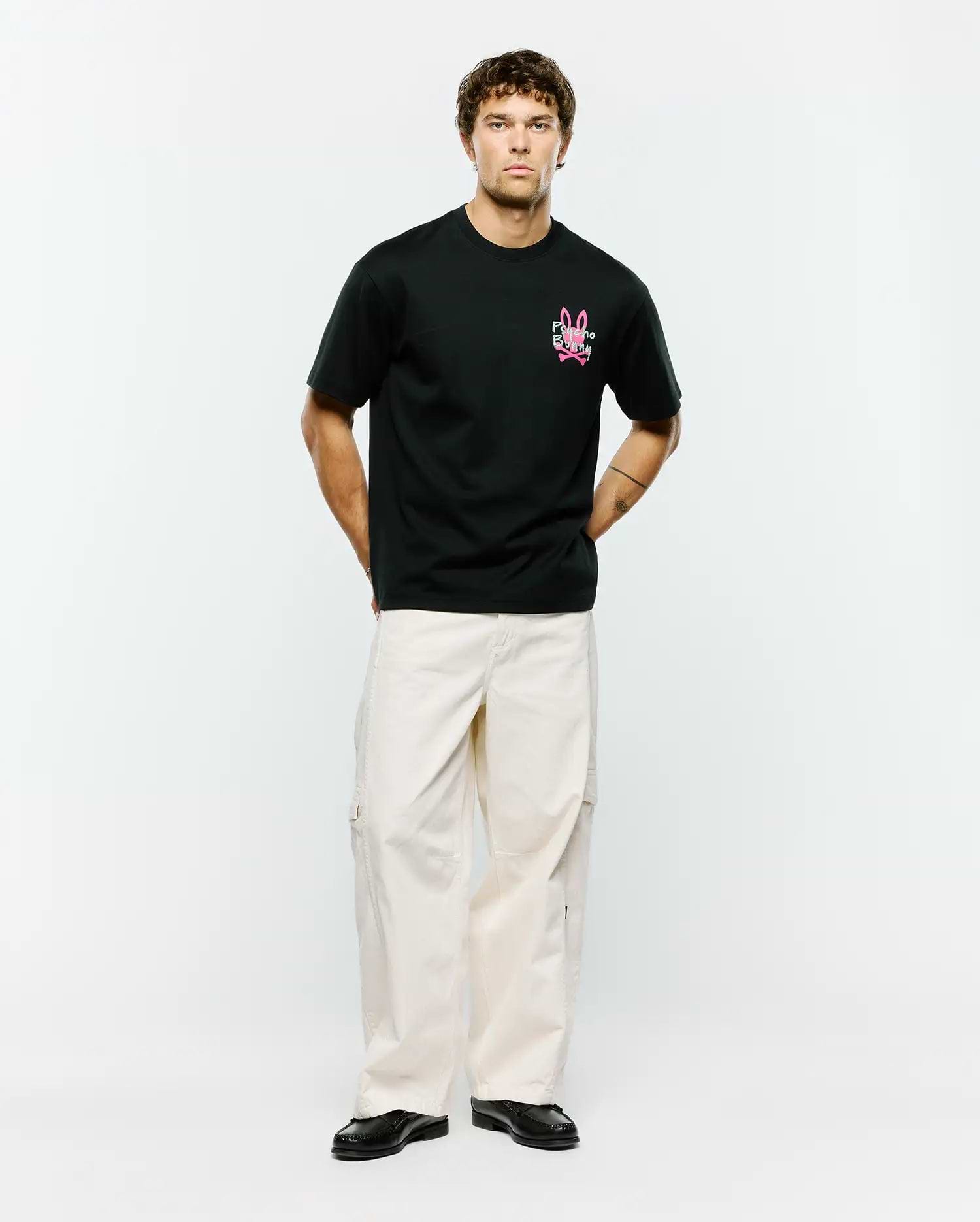 Mens Duncan Relaxed Fit Tee, a black relaxed fit jersey tee featuring a vibrant pink embroidered Psycho Bunny skull logo and text on the left chest.