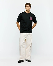 Mens Duncan Relaxed Fit Tee, a black relaxed fit jersey tee featuring a vibrant pink embroidered Psycho Bunny skull logo and text on the left chest.