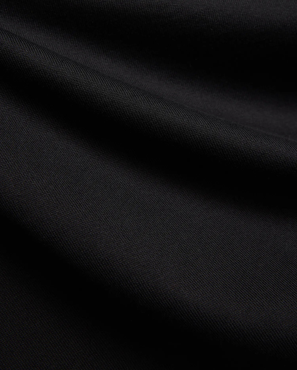 Black MENS DUNCAN RELAXED FIT TEE, a soft, premium jersey knit fabric with subtle folds, emphasizing its comfortable relaxed fit.