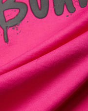 Mens Duncan Wordmark Relaxed Fit Tee in bright fuchsia jersey knit, featuring a large dark grey wordmark graphic with splatter details, designed for a relaxed fit.