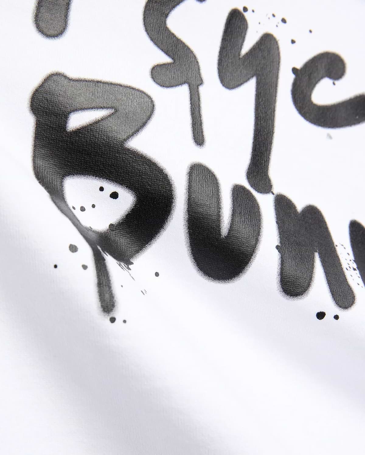 White Mens Duncan Wordmark Relaxed Fit Tee featuring a large, central black graffiti-style Psycho Bunny wordmark print with subtle paint splatters on smooth jersey fabric.