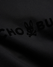 Mens Royce Graphic Tee, a black jersey knit t-shirt with a large, subtly raised, tonal black flocked Psycho Bunny skull logo and brand name graphic. (6)