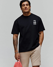 Black Mens Toby Oversized Tee, a relaxed fit in soft jersey knit, showcasing a bold white Psycho Bunny skull logo with PSYCHO BUNNY text on the left chest. (1)
