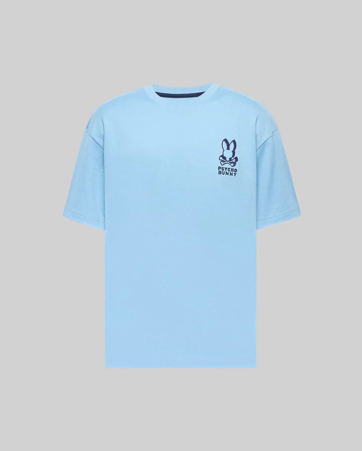 Mens Toby Oversized Tee in light blue jersey, featuring a relaxed fit and a dark blue Psycho Bunny skull logo with text on the left chest, plus a navy collar trim. (4)