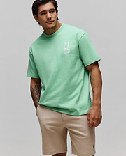 Mens Toby Oversized Tee in mint green, featuring a relaxed fit and soft jersey fabric. A white embroidered Psycho Bunny skull logo with text is prominently placed on the left chest. (1)
