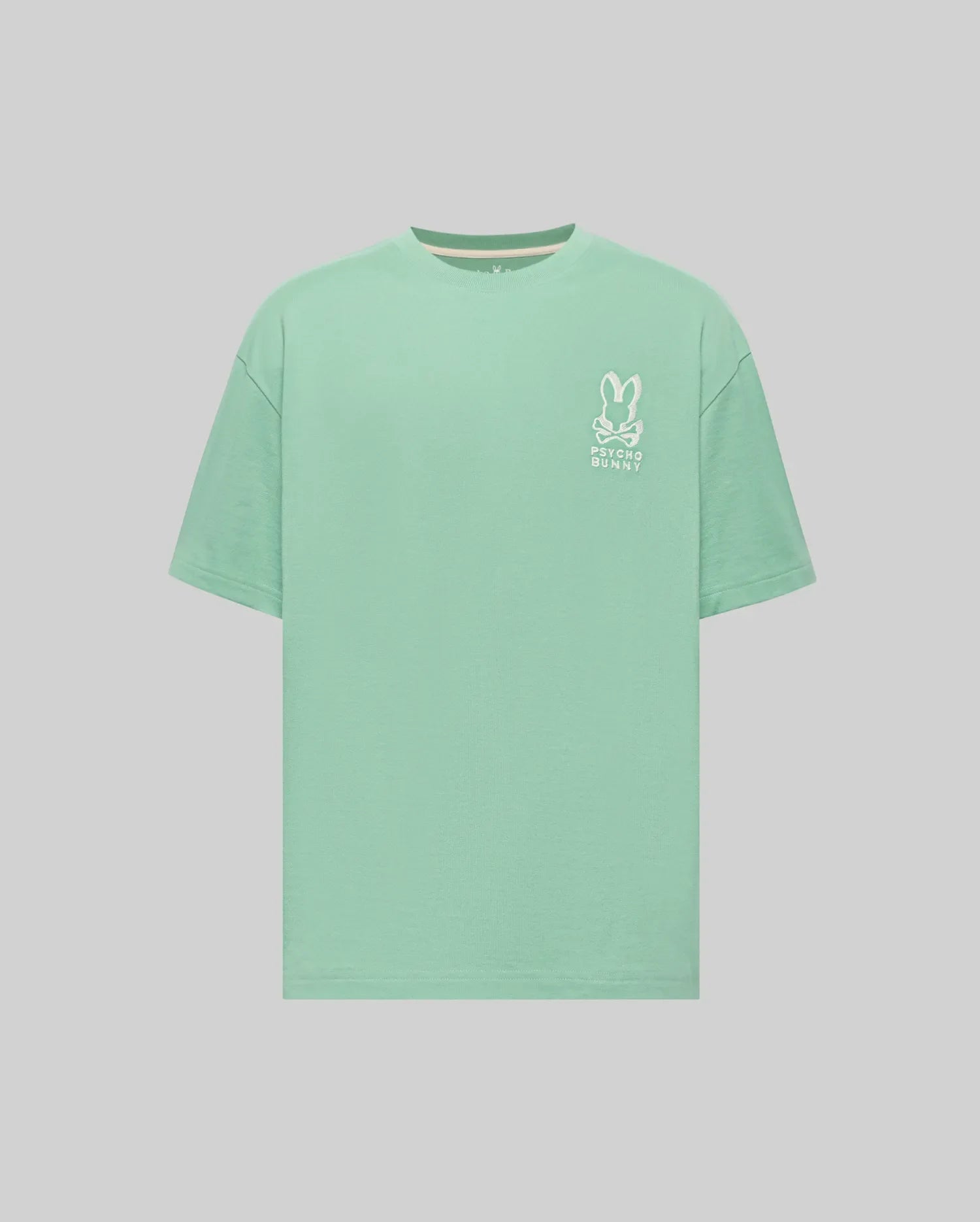 Mens Toby Oversized Tee in mint green, featuring a relaxed fit and smooth jersey fabric. A prominent white embroidered Psycho Bunny skull logo with text is on the left chest. (4)