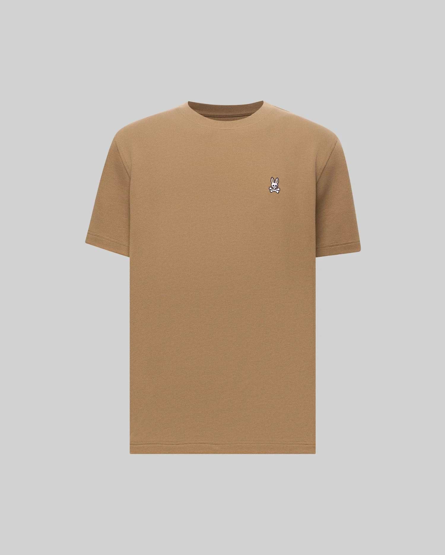 Camel Mens Maxton Waffle Tee with a classic fit, featuring a textured waffle knit fabric and a small, embroidered Psycho Bunny skull logo on the left chest.