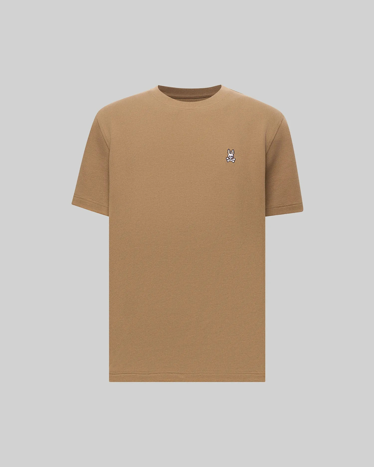 Camel Mens Maxton Waffle Tee with a classic fit, featuring a textured waffle knit fabric and a small, embroidered Psycho Bunny skull logo on the left chest.