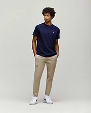 Navy blue Mens Maxton Waffle Tee with a classic fit, featuring a subtle waffle knit texture and a small white embroidered Psycho Bunny skull logo on the left chest. (4)