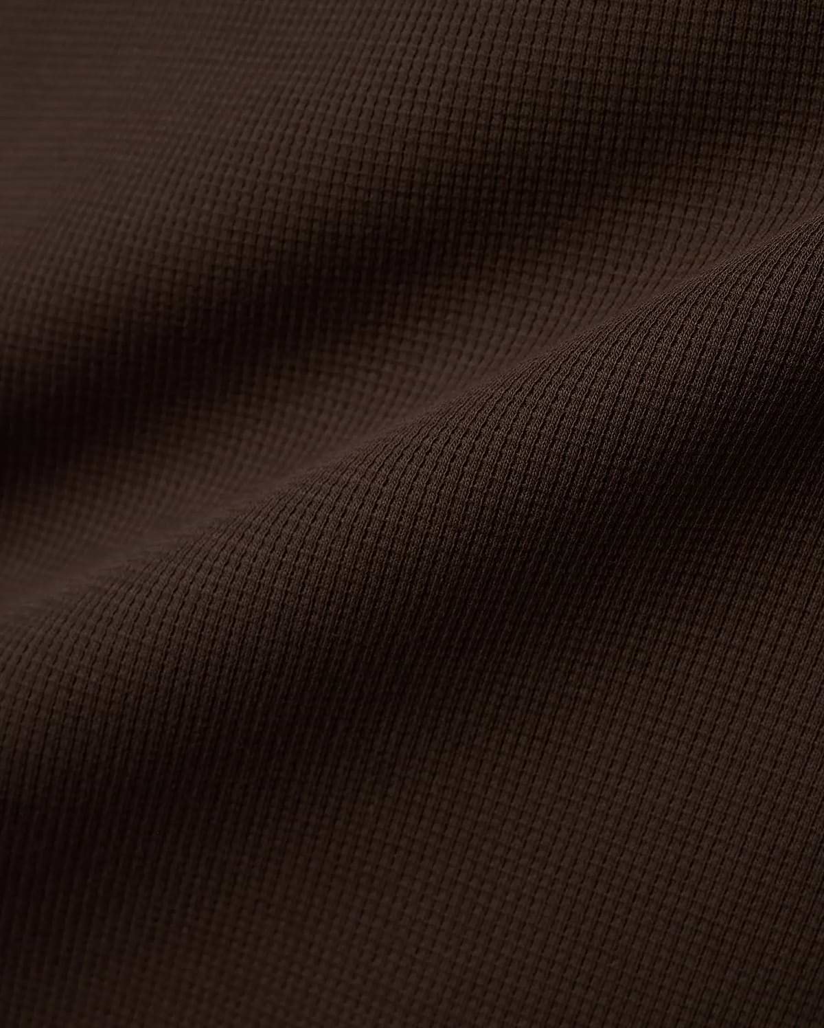 Men's Maxton Waffle Tee in a deep, luxurious dark brown, featuring a prominent and textured waffle knit fabric with subtle folds, highlighting its premium quality. (5)