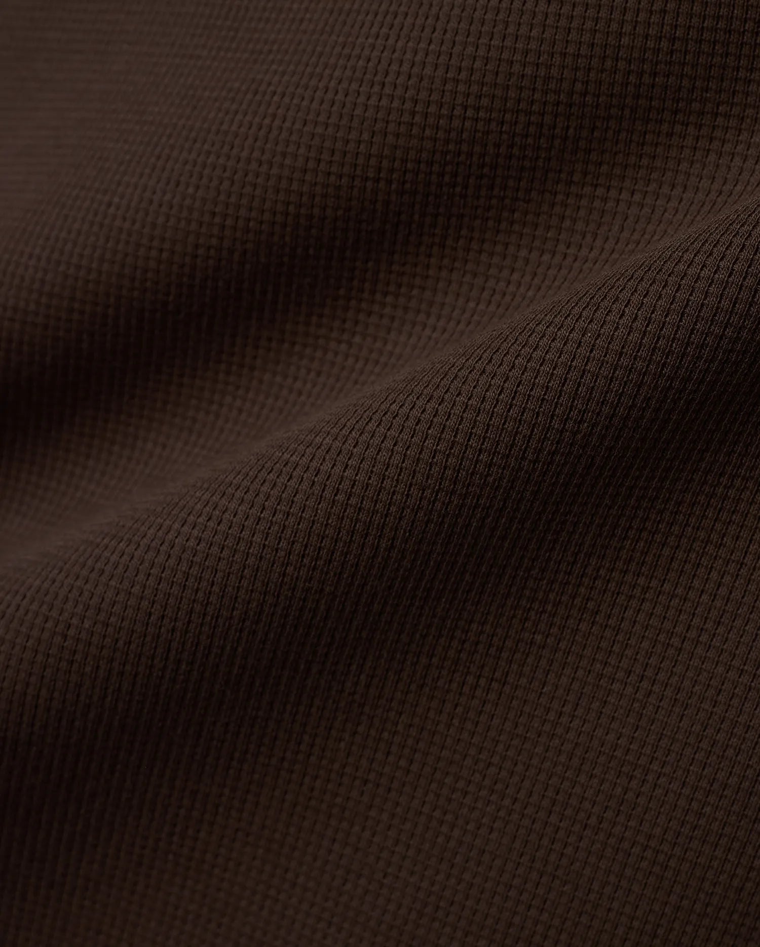 Men's Maxton Waffle Tee in a deep, luxurious dark brown, featuring a prominent and textured waffle knit fabric with subtle folds, highlighting its premium quality. (5)
