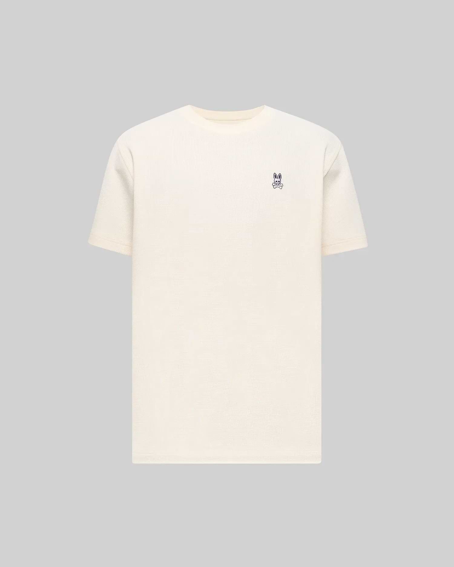Mens Maxton Waffle Tee in cream, featuring a classic fit and a textured waffle knit fabric. Small embroidered navy Psycho Bunny skull logo on the left chest.