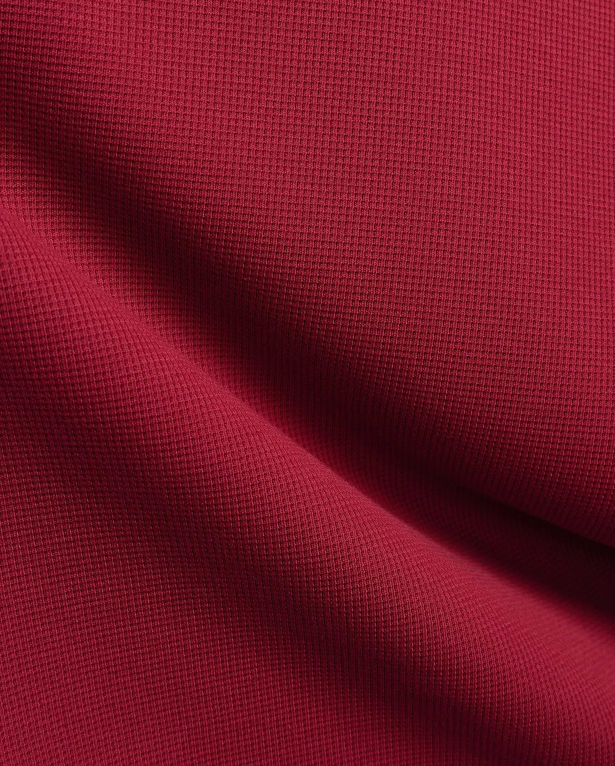 Burgundy Mens Maxton Waffle Tee, a premium streetwear staple crafted from soft, breathable waffle knit fabric, showcasing rich texture and the iconic small embroidered Psycho Bunny skull logo on the left chest.
