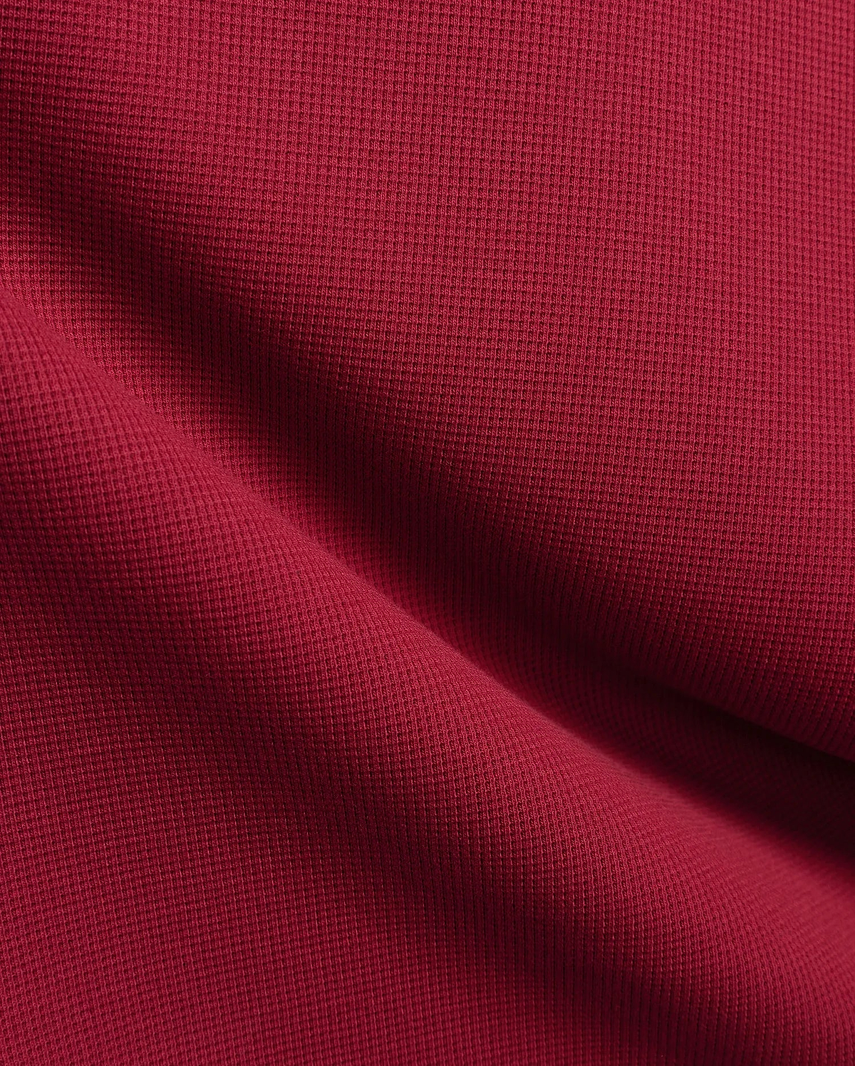 Burgundy Mens Maxton Waffle Tee, a premium streetwear staple crafted from soft, breathable waffle knit fabric, showcasing rich texture and the iconic small embroidered Psycho Bunny skull logo on the left chest.