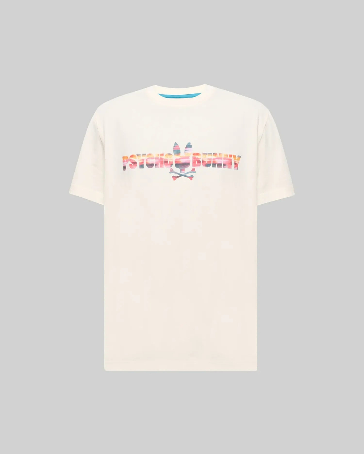 Mens Raphael Wordmark Tee, a cream classic fit jersey t-shirt featuring a large central graphic print of the Psycho Bunny wordmark and iconic bunny skull logo in a vibrant sunset gradient pattern. (5)