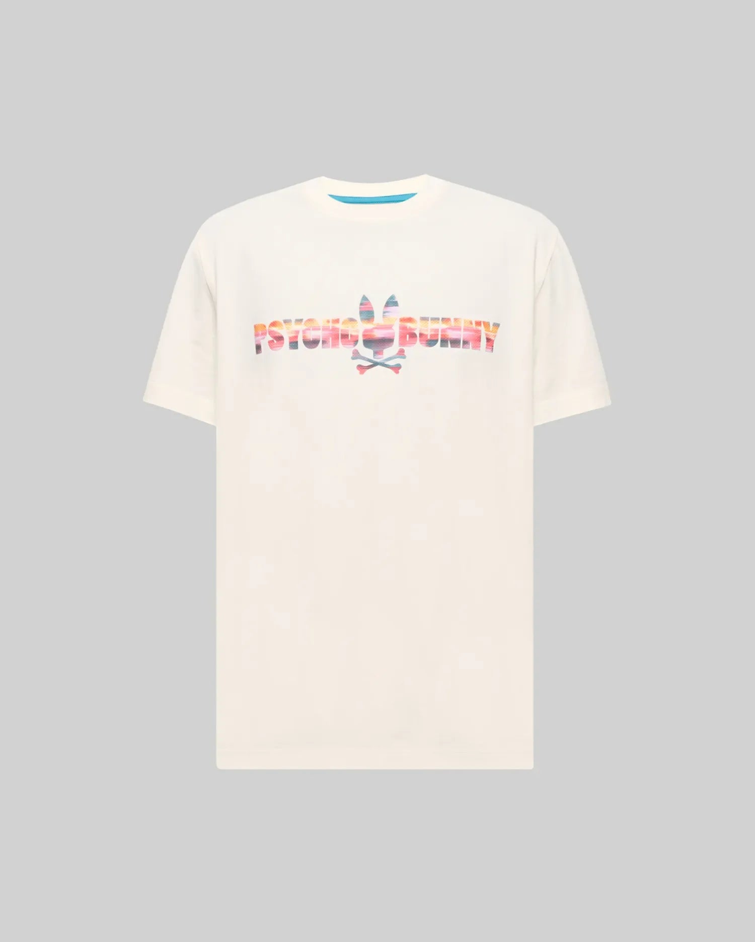 Mens Raphael Wordmark Tee, a cream classic fit jersey t-shirt featuring a large central graphic print of the Psycho Bunny wordmark and iconic bunny skull logo in a vibrant sunset gradient pattern. (5)