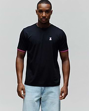 Mens Clark Performance Tee, a black classic fit smooth jersey t-shirt with a small embroidered pink and white Psycho Bunny skull logo on the left chest and ribbed sleeve cuffs featuring pink and white stripes.