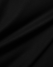 Mens Holden Tee, a premium Psycho Bunny black t-shirt crafted from soft jersey knit fabric, displaying subtle drapes and a smooth texture, reflecting refined quality.