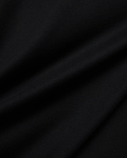 Mens Holden Tee, a premium Psycho Bunny black t-shirt crafted from soft jersey knit fabric, displaying subtle drapes and a smooth texture, reflecting refined quality.