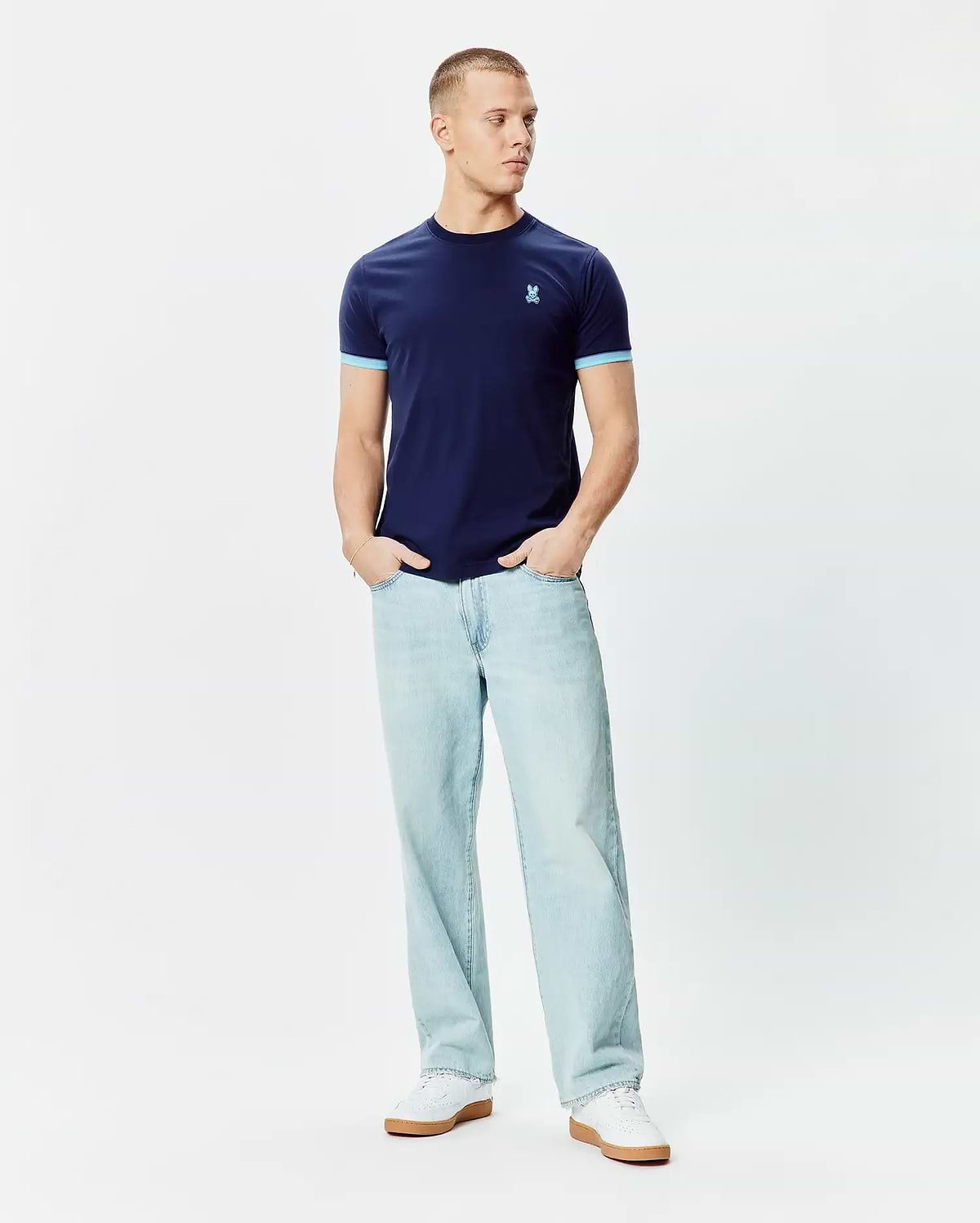 Mens Holden Tee, classic fit navy blue jersey t-shirt with light blue ribbed cuffs and a small embroidered Psycho Bunny skull logo on the left chest. (4)