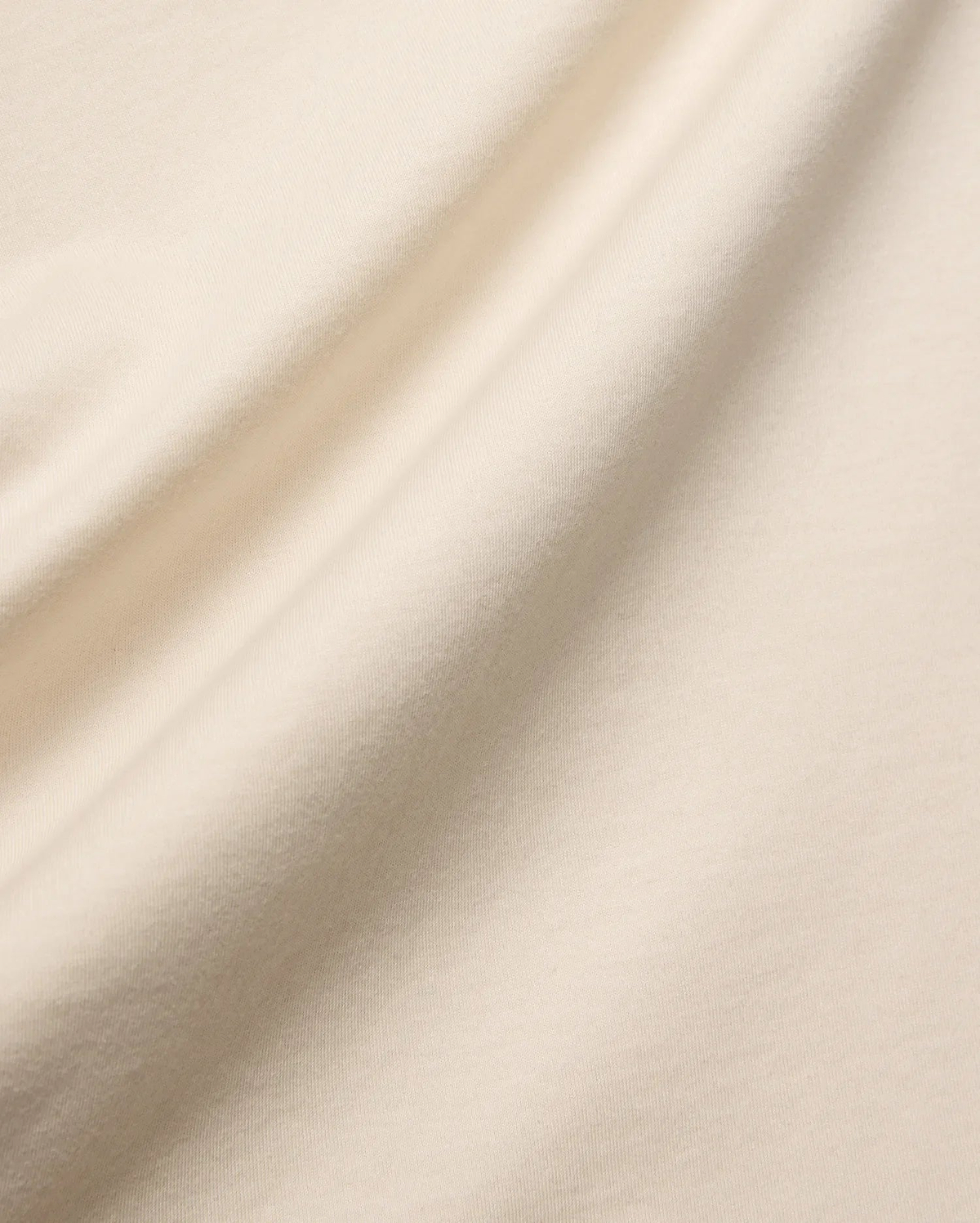Mens Holden Tee, a premium light beige jersey t-shirt, featuring a smooth, soft texture and elegant drape, highlighting Psycho Bunny's quality craftsmanship. (6)