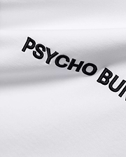 White Mens Haiden Relaxed Heavy Weight Tee, a heavy jersey knit, featuring prominent black embroidered PSYCHO BUNNY text diagonally across the front.