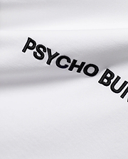 White Mens Haiden Relaxed Heavy Weight Tee, a heavy jersey knit, featuring prominent black embroidered PSYCHO BUNNY text diagonally across the front.