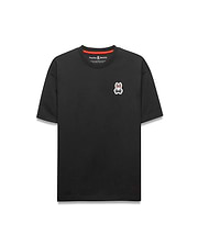 Black Mens Jaydon Relaxed Fit Tee with a red inner neckline, featuring a small embroidered white, red, and black Psycho Bunny skull logo on the left chest. Soft jersey knit, relaxed fit.