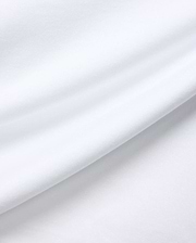 White MENS JAYDON RELAXED FIT TEE, a premium Psycho Bunny garment crafted from soft, breathable jersey fabric, showcasing subtle texture and gentle folds for ultimate comfort.