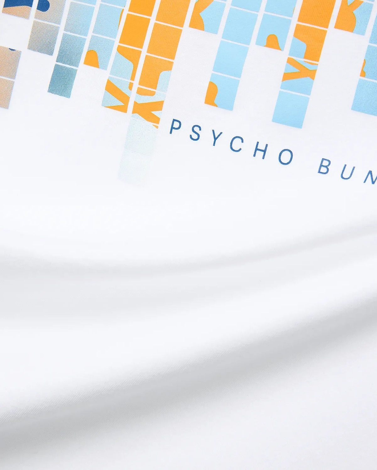 White Mens Zander Graphic Tee with a vibrant pixelated orange, light blue, and beige graphic print, featuring the signature dark blue PSYCHO BUNNY text logo prominently on the front chest, crafted from soft jersey. (7)
