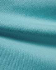 Men's Norman Longsleeve Oversized Tee in a vibrant aqua hue, highlighting the premium, soft jersey knit fabric with a smooth, comfortable texture and subtle draping. (6)